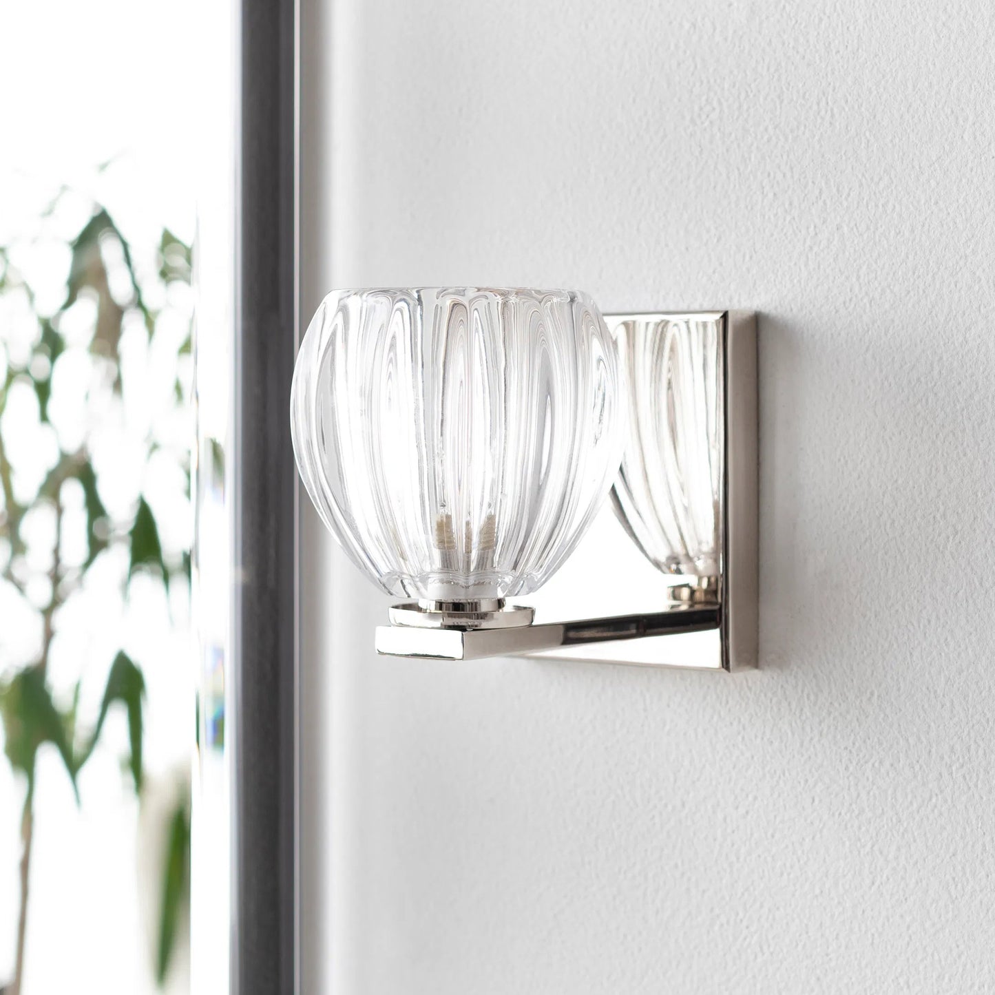 003 SI-2046373 | Lifestyle | Wallace Wall Sconce by Surya in clear, metallic bronze, metallic nickel and polished. Made from fixture: metal in a modern style.