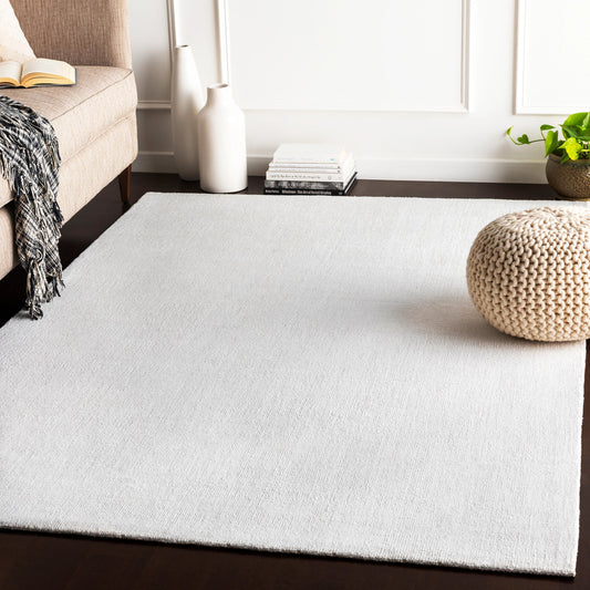 Wilkinson Rug by Livabliss in white. Made from face: 100% polyester, warp: 100% cotton in a coastal style.
