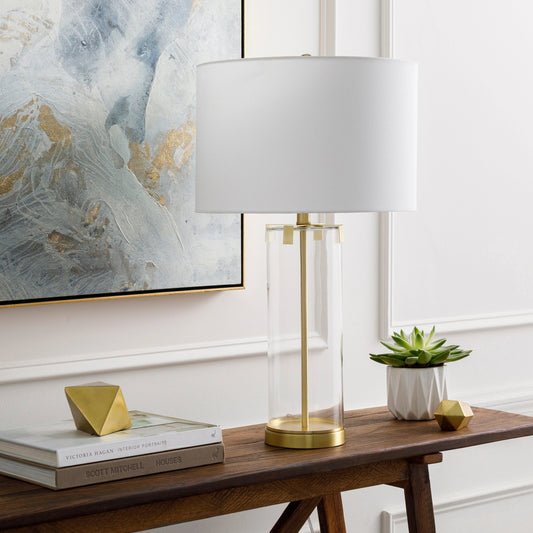 Wanaka - 30310 by Surya in metallic brass, clear, translucent, white and brushed, brushed. Made from shade (outside): linen, shade (inside): polyester, body: glass, base: metal, finial: metal, harp: metal in a traditional style