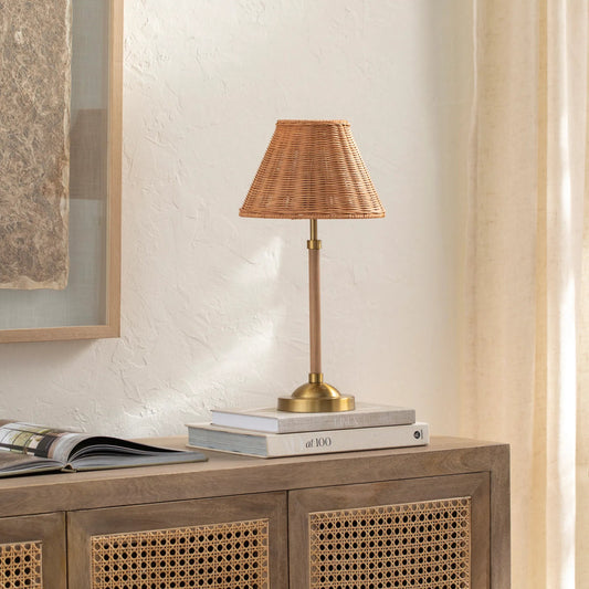 Xander Accent Table Lamp by Livabliss in body: wood, base: gold, shade (outside): tan, shade (inside): cream, cord: translucent and brushed wood finish. Made from body: metal, base: metal, shade (outside): rattan, shade (inside