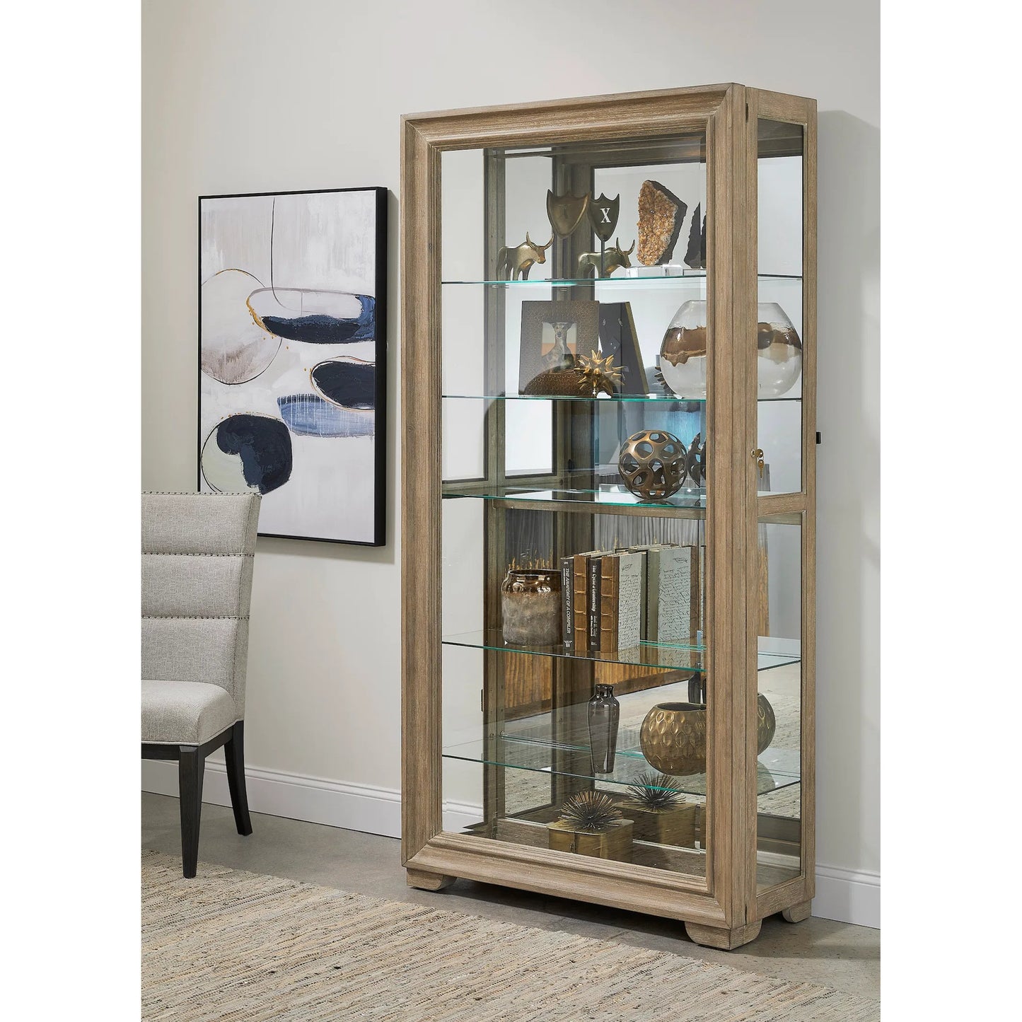004 SI-2238728 | Lifestyle | Light Wood Modern 5-Shelf Sliding Door Curio with LED Light by Pulaski Furniture in parchment. Made from ash wood veneers in a transitional style.