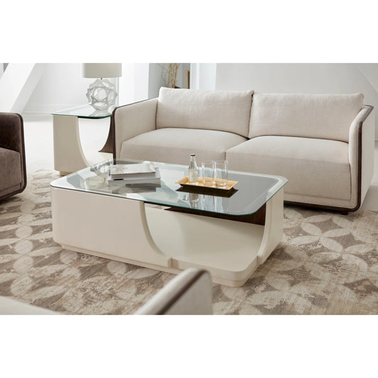 Blanc Cocktail Table by A.R.T. Furniture in alabaster, burnished bronze. Made from parawood solids, resin, metal, glass in a modern style.