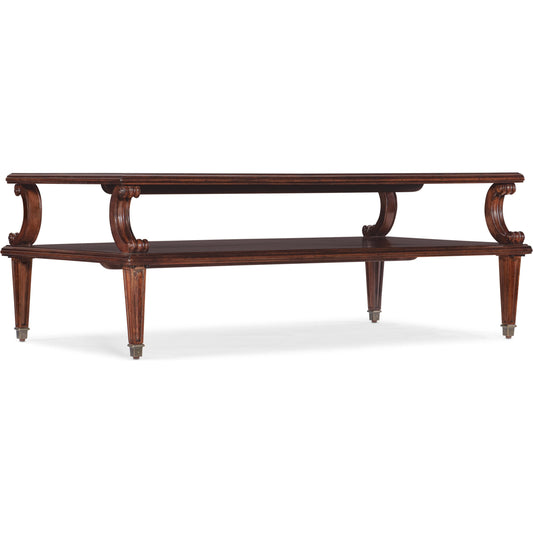 Charleston Rectangle Cocktail Table by Hooker Furniture in maraschino cherry. Made from cherry veneers with walnut inlay, metal ferrules, resin in a transitional style.