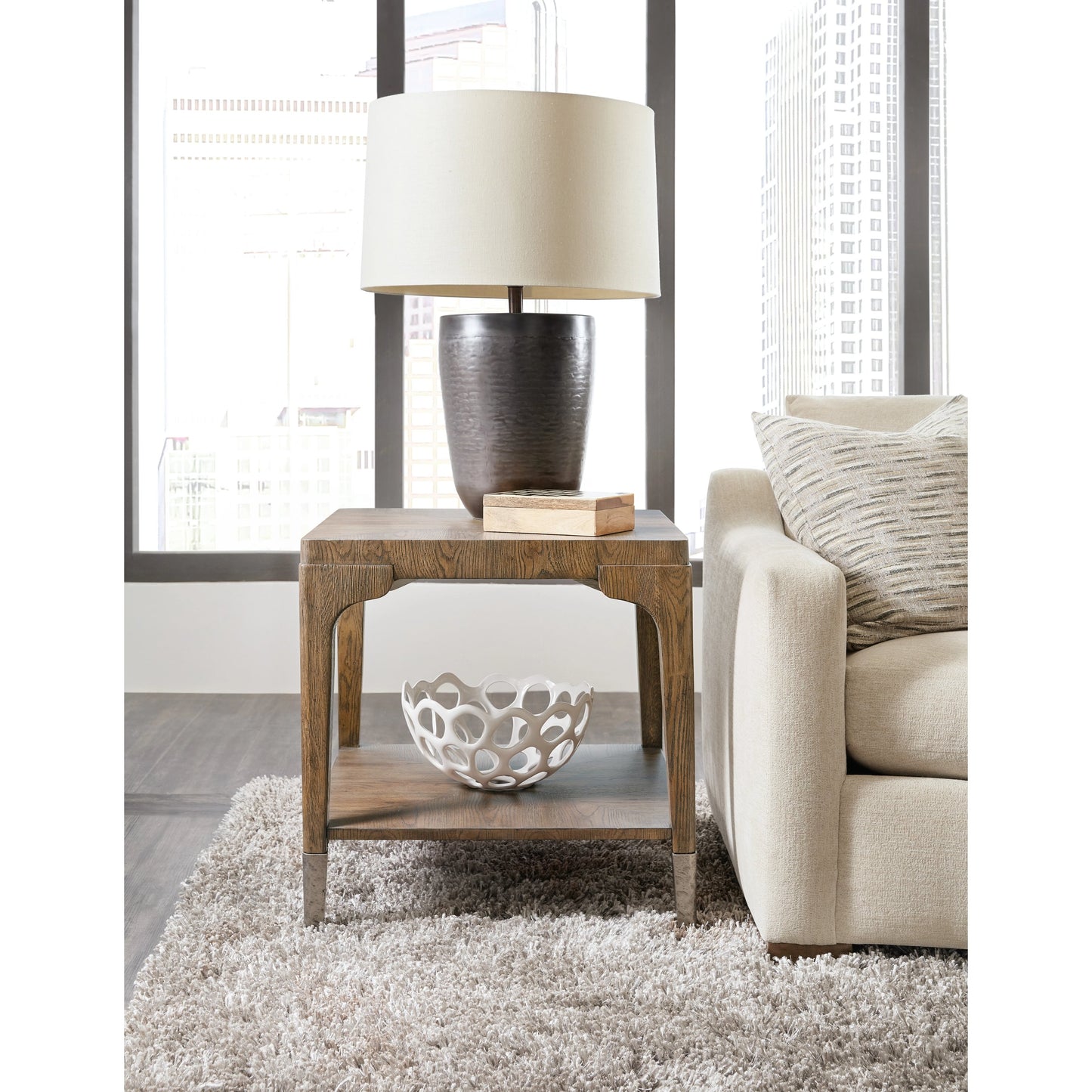004 SI-1959572 | Lifestyle | Chapman Rectangle End Table by Hooker Furniture in sorrel. Made from white oak veneers, metal ferrules in a transitional style.