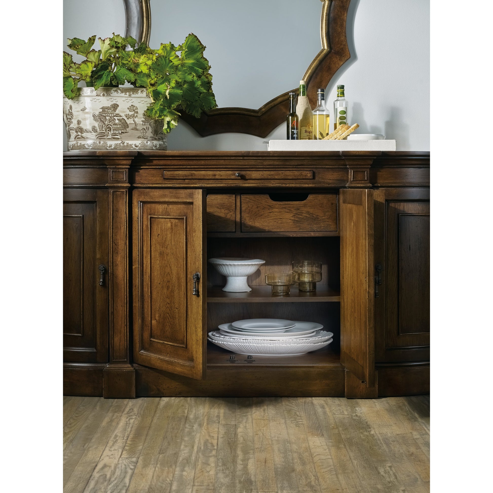 Archivist Sideboard by Hooker Furniture in pecan. Made from pecky pecan veneers, blue stone in a traditional style.