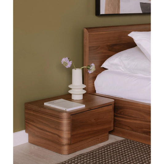 Round Off Small Nightstand by Moe's Home Collection in natural walnut. Made from walnut veneer, mdf, rubbwrwood base in a transitional style.