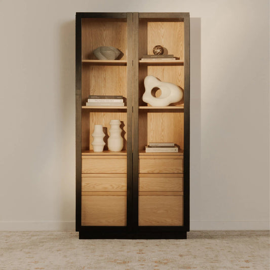 Charlotte Cabinet by Moe's Home Collection in black ash, natural ash, oak. Made from solid ash door frame, drawer handle, ash veneer over mdf body, oak veneer shelf, inner drawer, rubber wood base, 5mm tempered glass in a moder