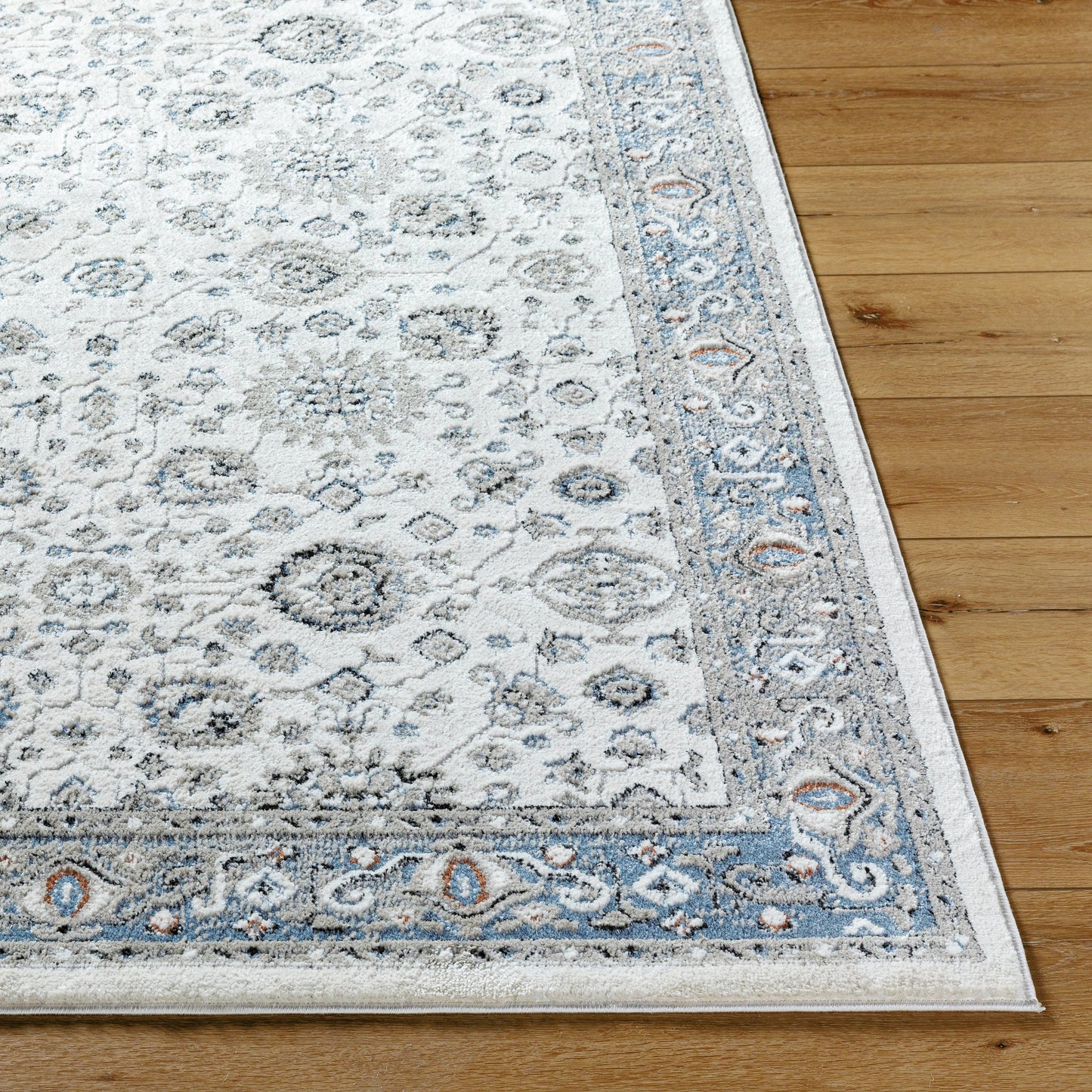 003 SI-2167753,SI-2167754 | Closeup | Zidane Rug - 494508 by Livabliss in white, dark brown, blue, black, olive, rust. Made from polyester in a unique style.
