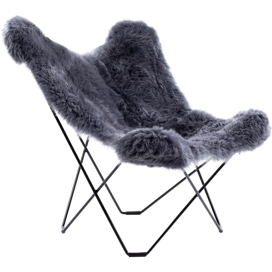 Nizhoni - 31051 by Surya. Made from top: sheepskin, base: metal in a modern style.