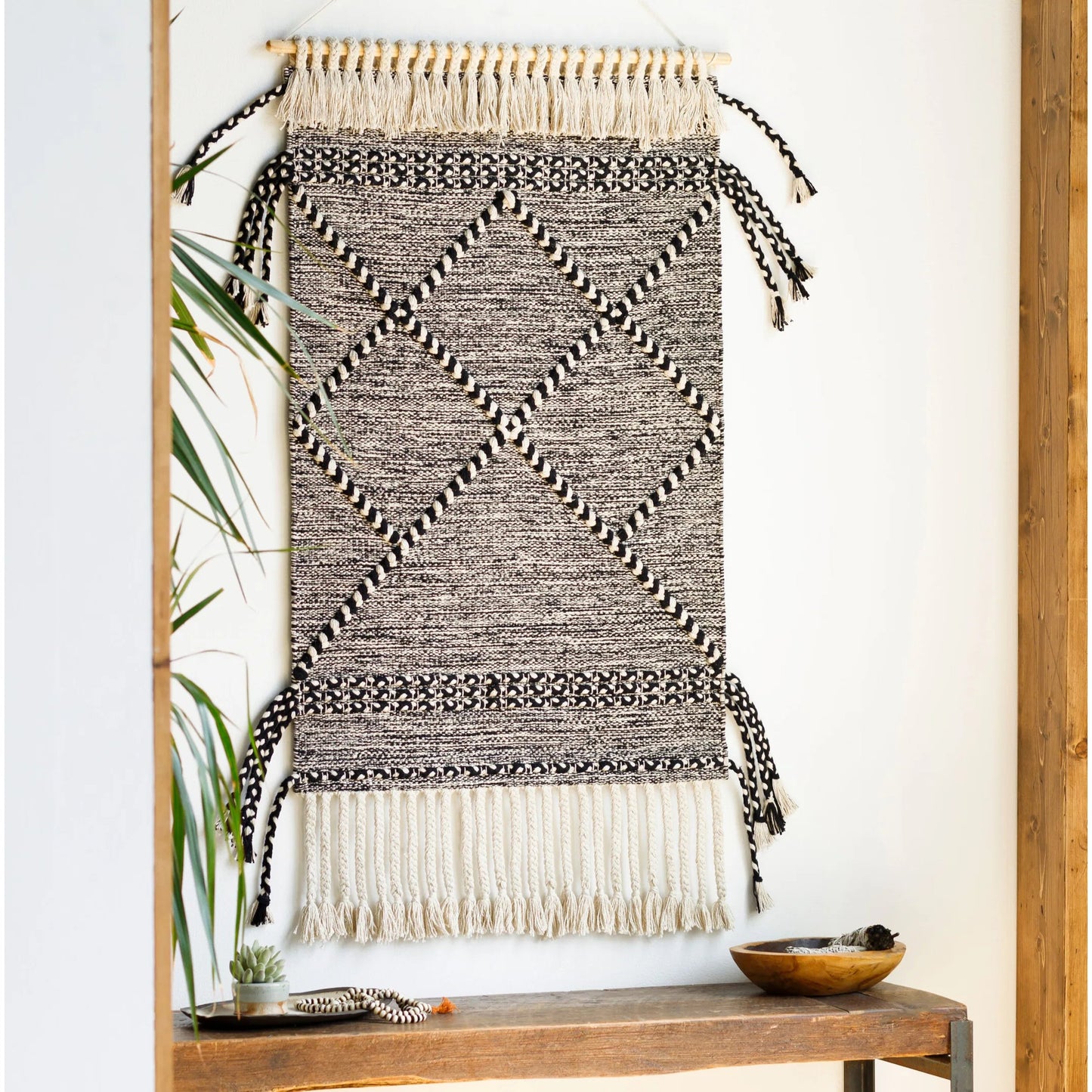 002 SI-1893892 | Lifestyle | Zanafi Tassels Indoor/Outdoor Wall Hanging by Surya in beige, black. Made from 100% cotton, 100% wood in a eclectic & global style.