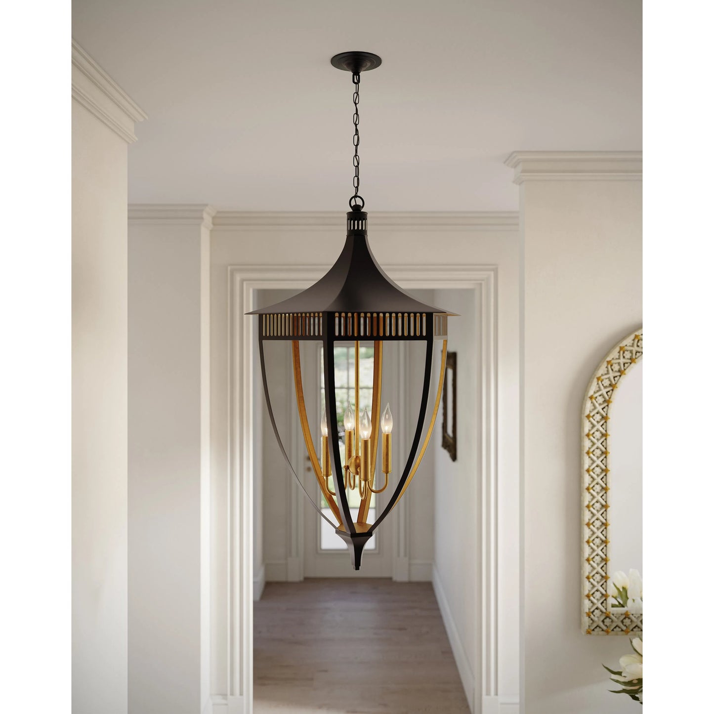 007 SI-2191875 | Lifestyle | Wycombe Lantern by Currey and Company in satin black, contemporary gold leaf. Made from wrought iron in a modern style.