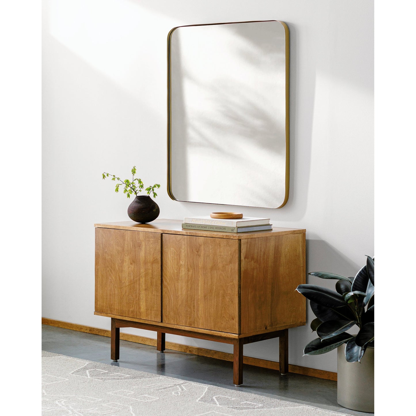 003 SI-1948567 | Lifestyle | Zuhan Indoor/Outdoor Mirror by Surya in gold and powder coated. Made from frame: metal, substrate: manufactured wood in a modern style.