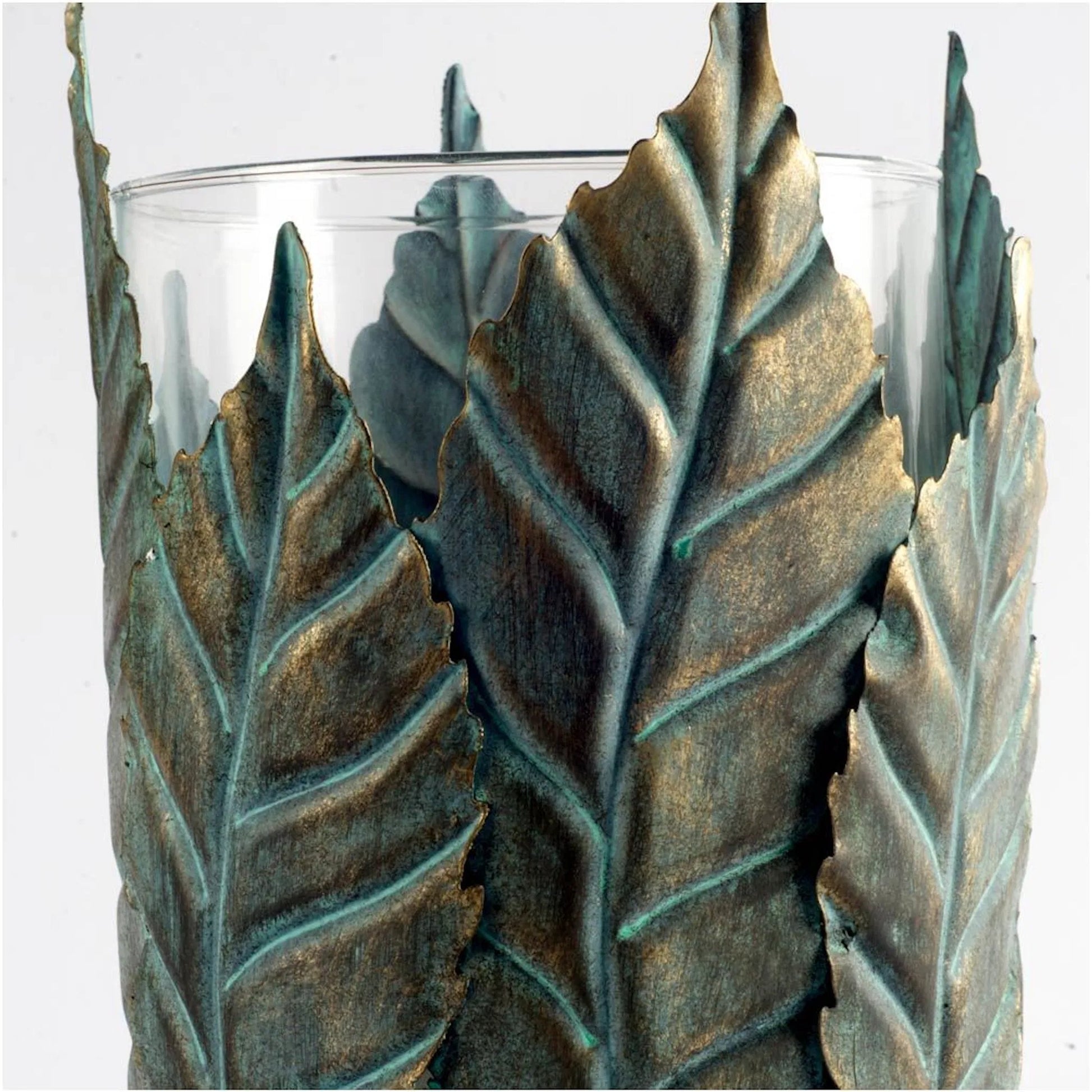 Pana I Leaf Table Candle Holder by Mercana in natural. Made from unique in a coastal style.