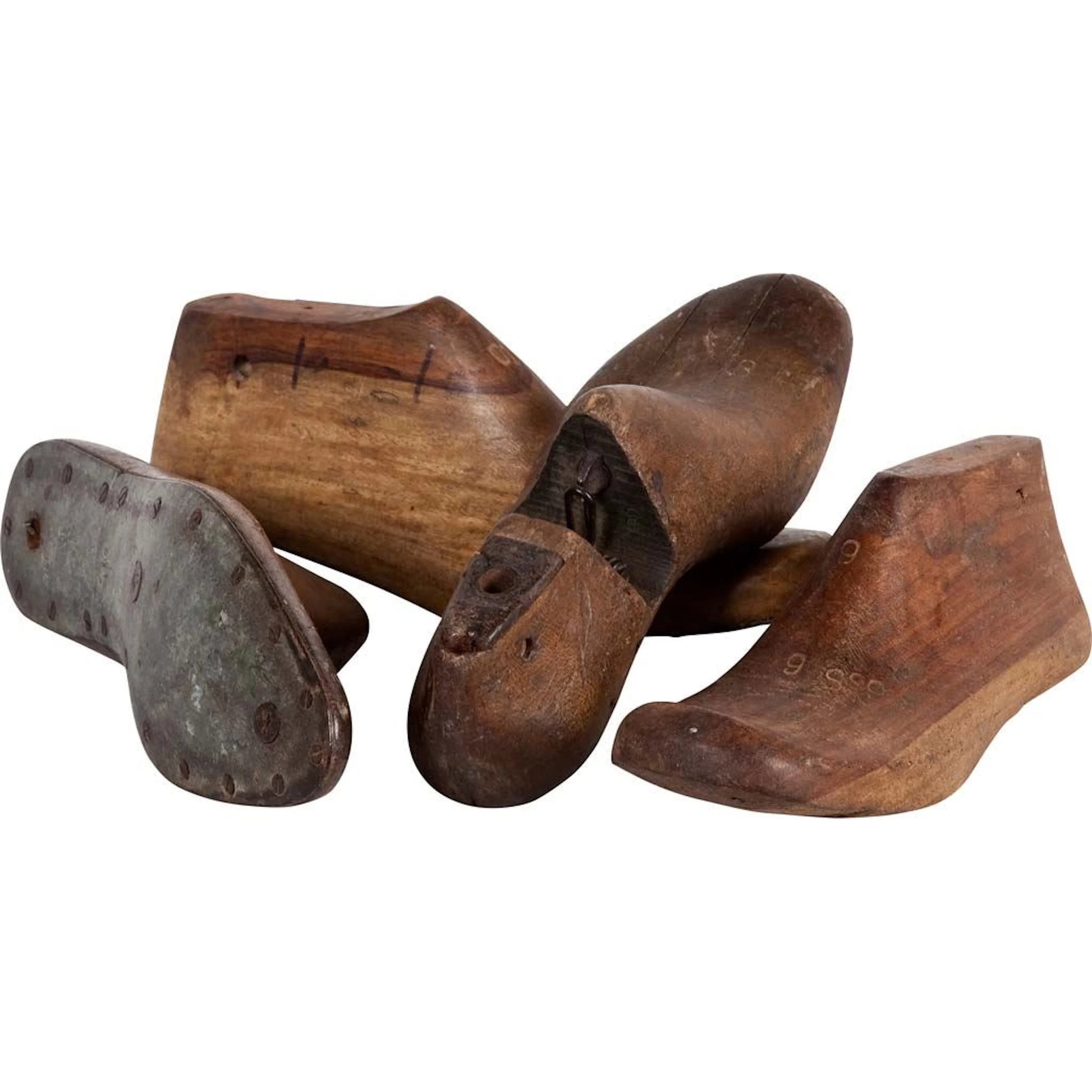 Wooden Shoe Antique Wooden Cobbler Moulds Set of Four by Mercana in brown. Made from wood in a cottage & farmhouse style.