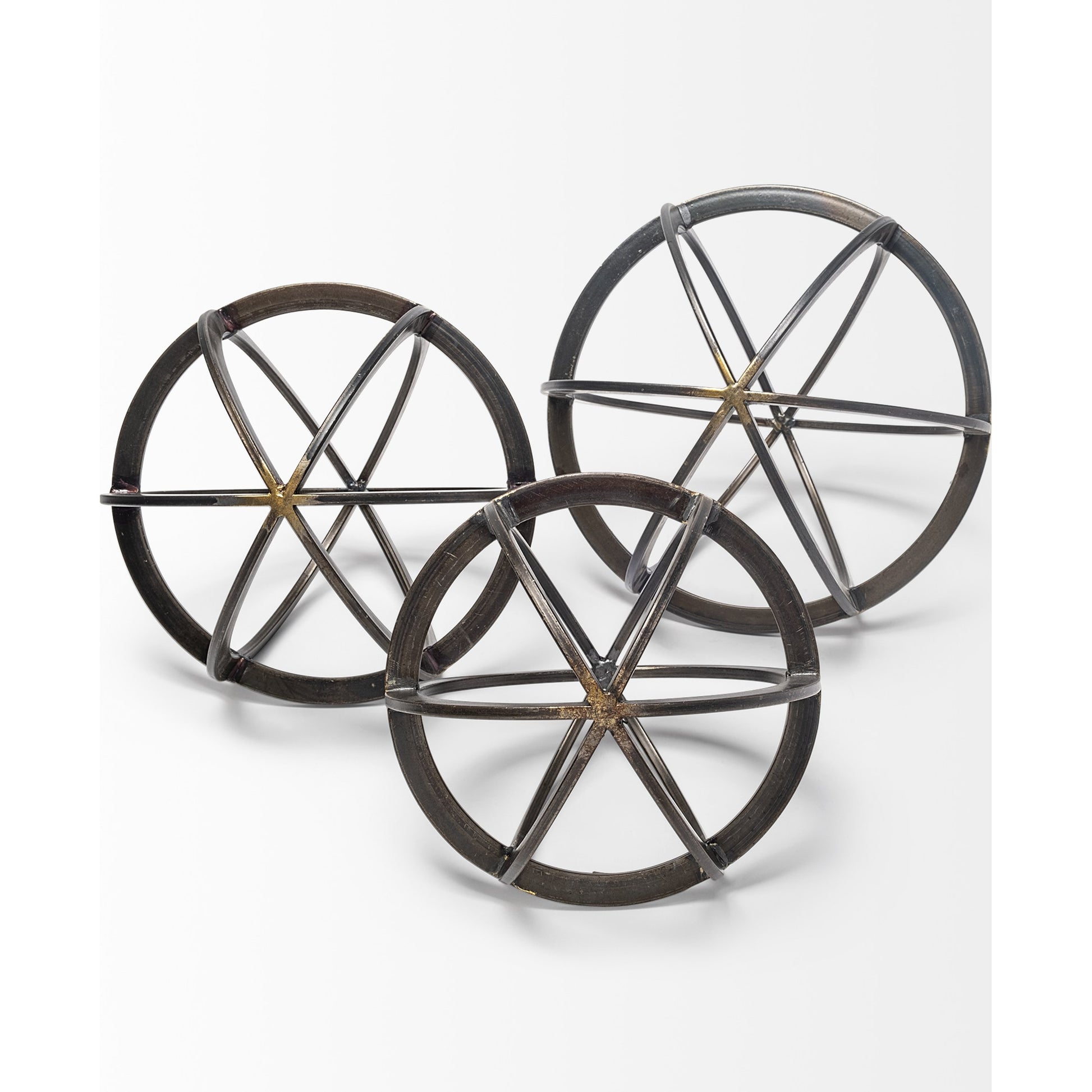 Galenna II Circular Decorative Orb by Mercana in black. Made from unique in a modern style.