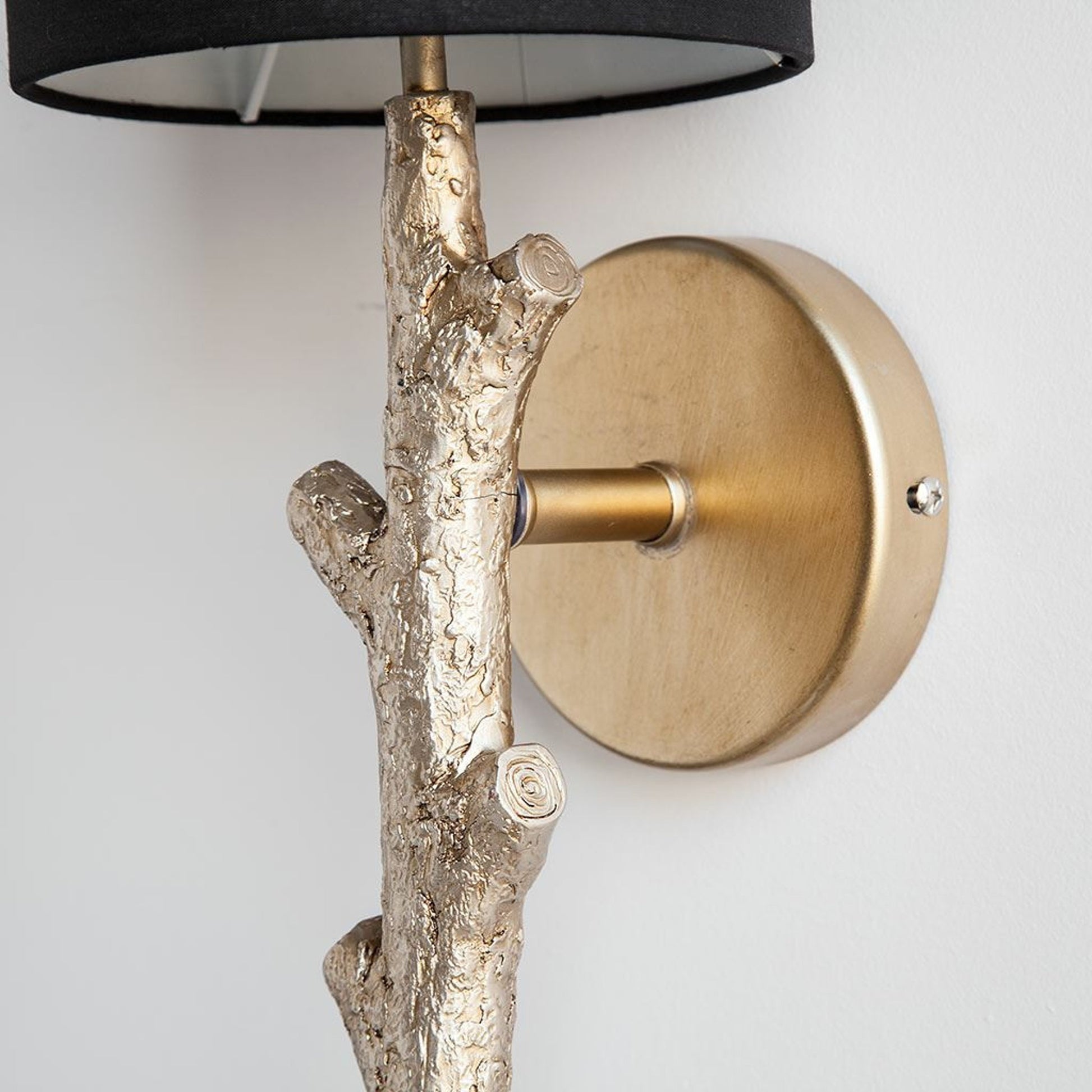 Sabinal Wall Sconce by Mercana in gold. Made from unique in a modern style.