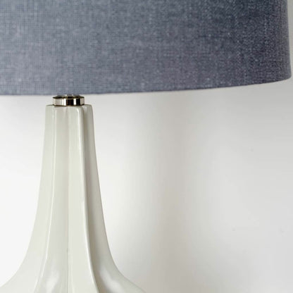 Bravar Table Lamp by Mercana in black. Made from unique in a modern style.