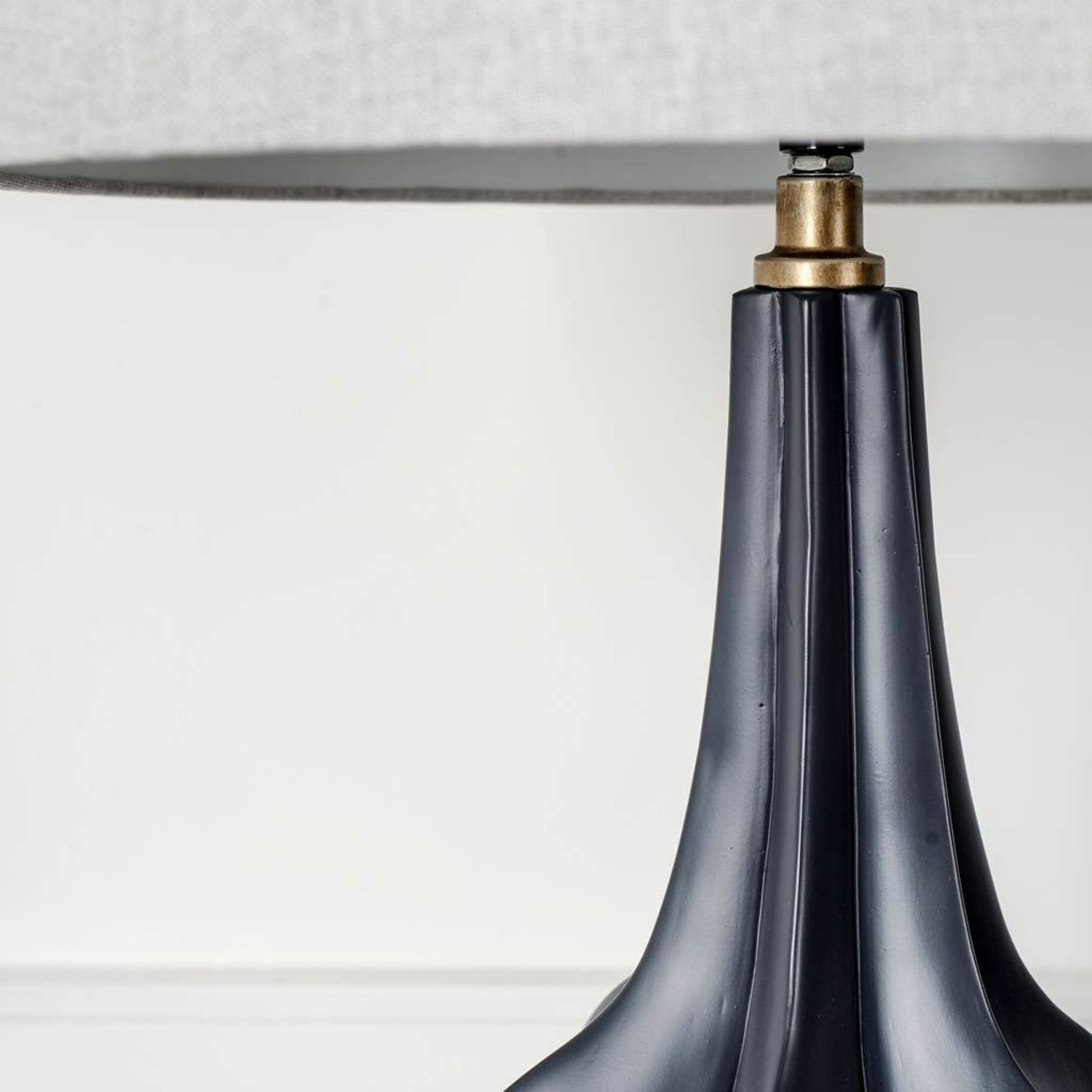 Bravar Table Lamp by Mercana in black. Made from unique in a modern style.