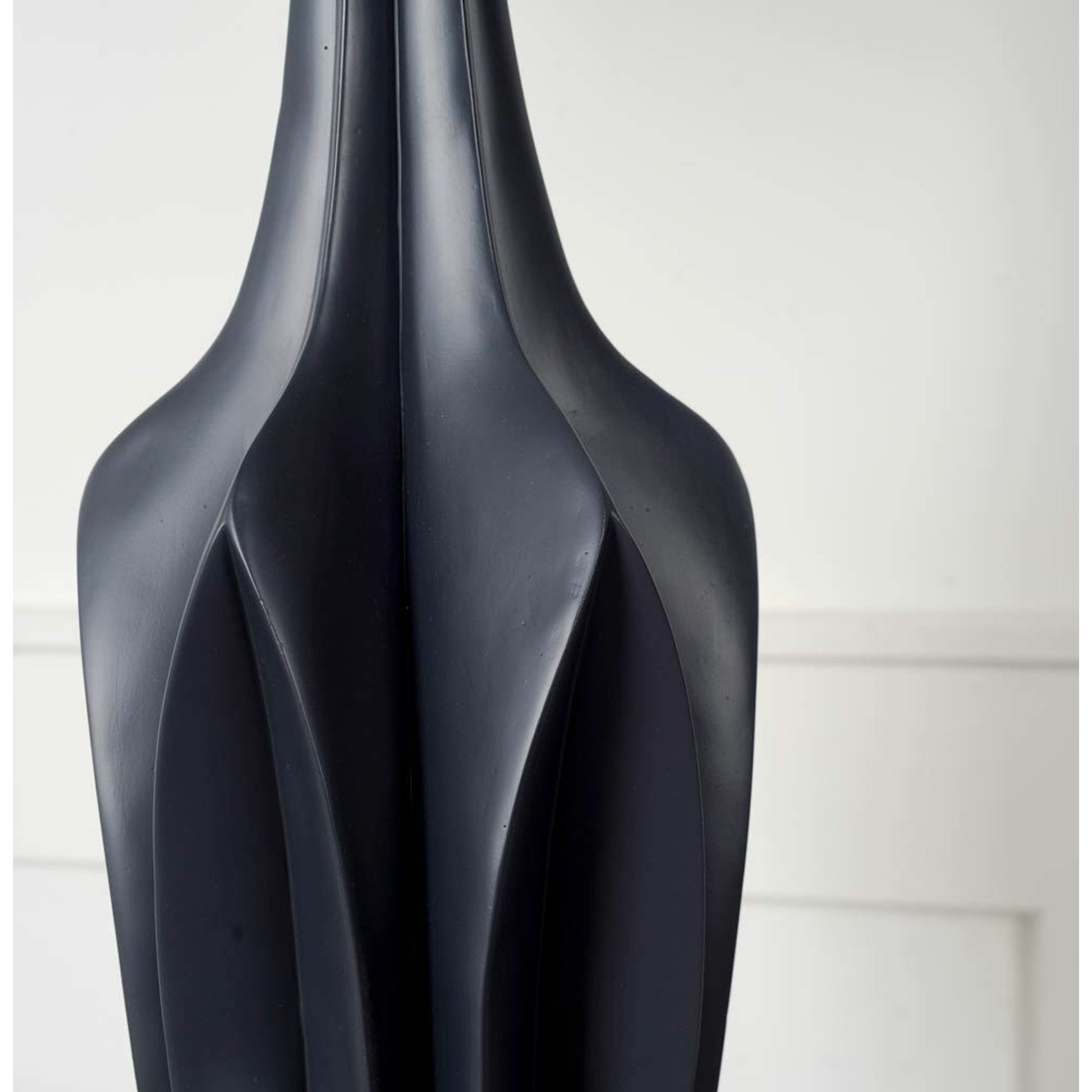 Bravar Table Lamp by Mercana in black. Made from unique in a modern style.