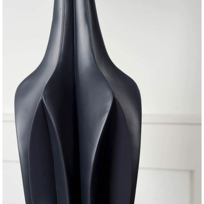 Bravar Table Lamp by Mercana in black. Made from unique in a modern style.