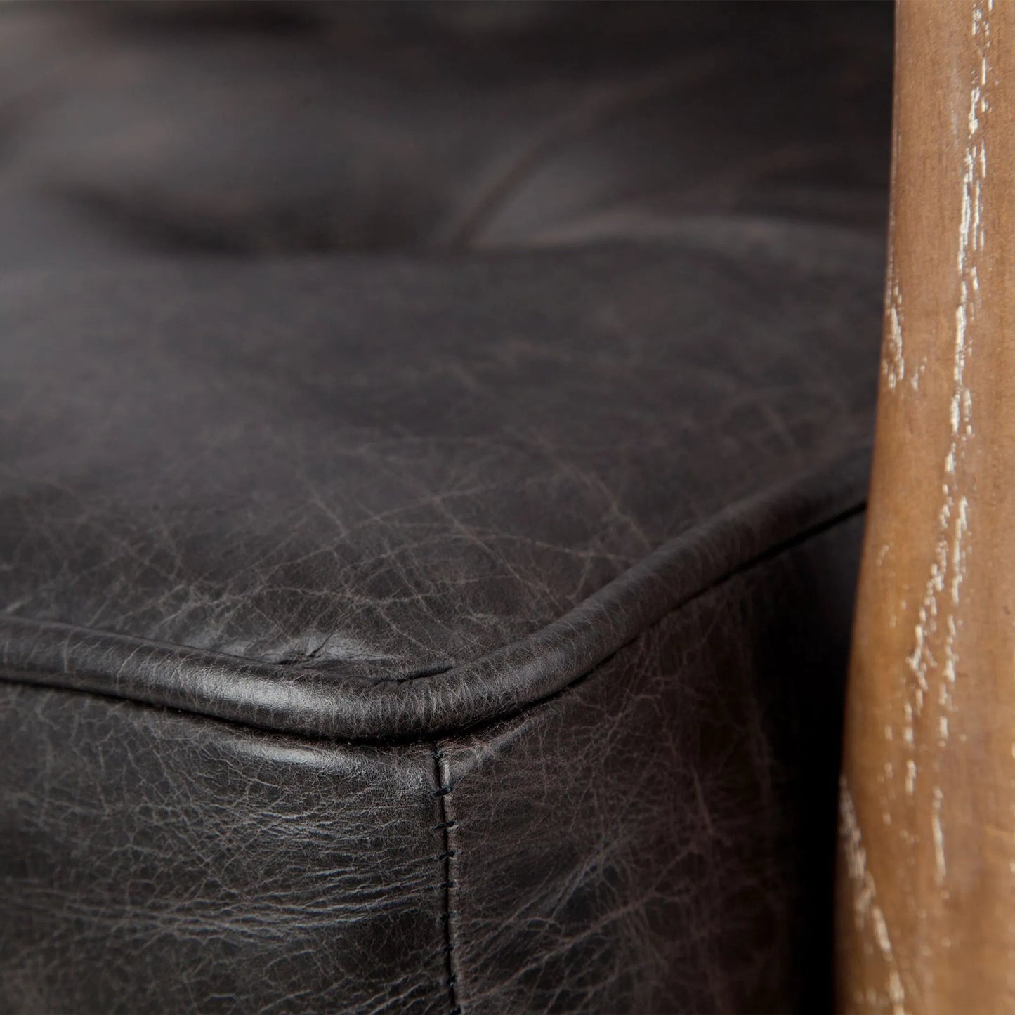 040 SR-746366 | Closeup | Phineas Leather Accent Chair by Mercana in black. Made from top grain leather in a modern style.