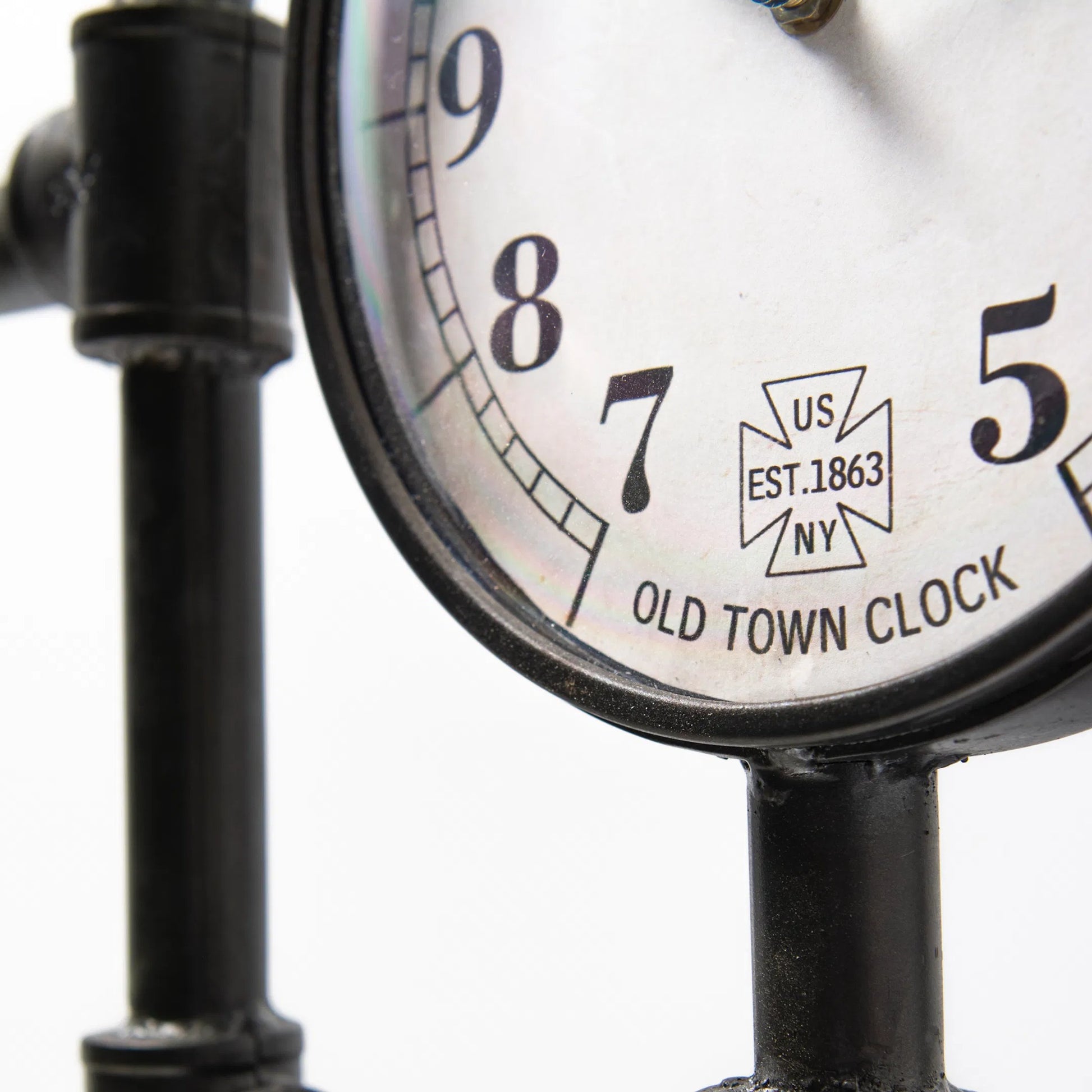 Trifect Iron Pipe Three Face Floor Clock by Mercana in black. Made from metal in a modern style.