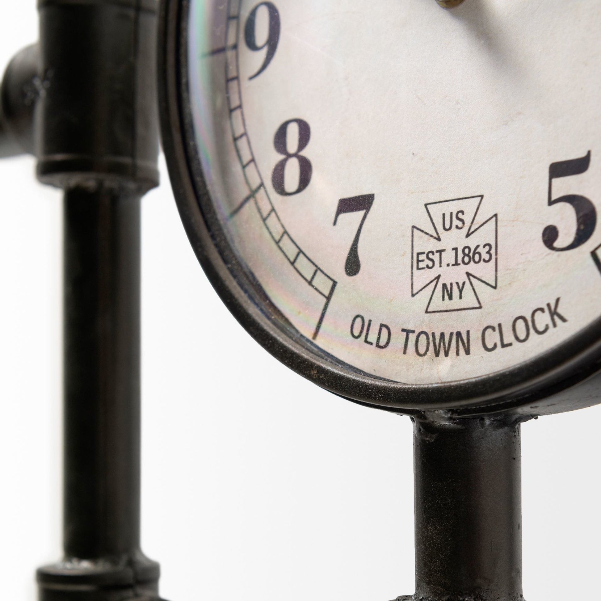 Trifect Iron Pipe Three Face Floor Clock by Mercana in black. Made from metal in a modern style.