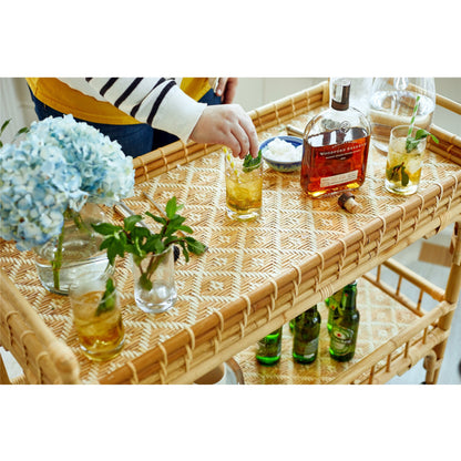 5 O'Clock Bar Cart by Coastal Living by Universal Furniture in antique brass and natural rattan. Made from unique in a coastal style.