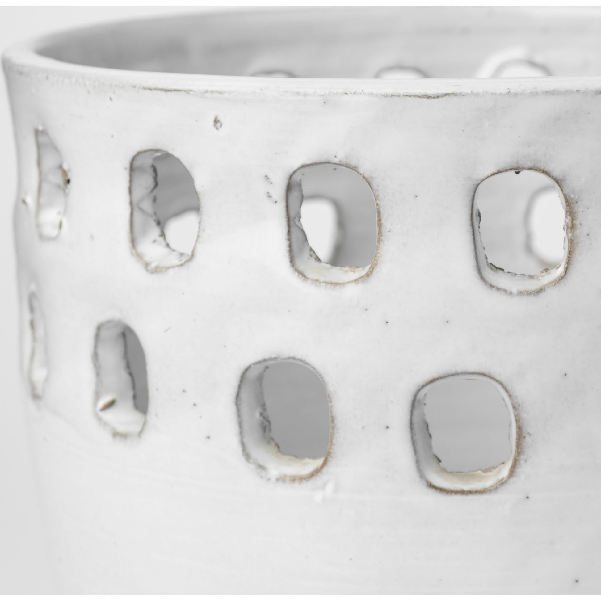 Larissa Hollow Pattern Vases Set of Two by Mercana in pearl white. Made from ceramic in a eclectic & global style.