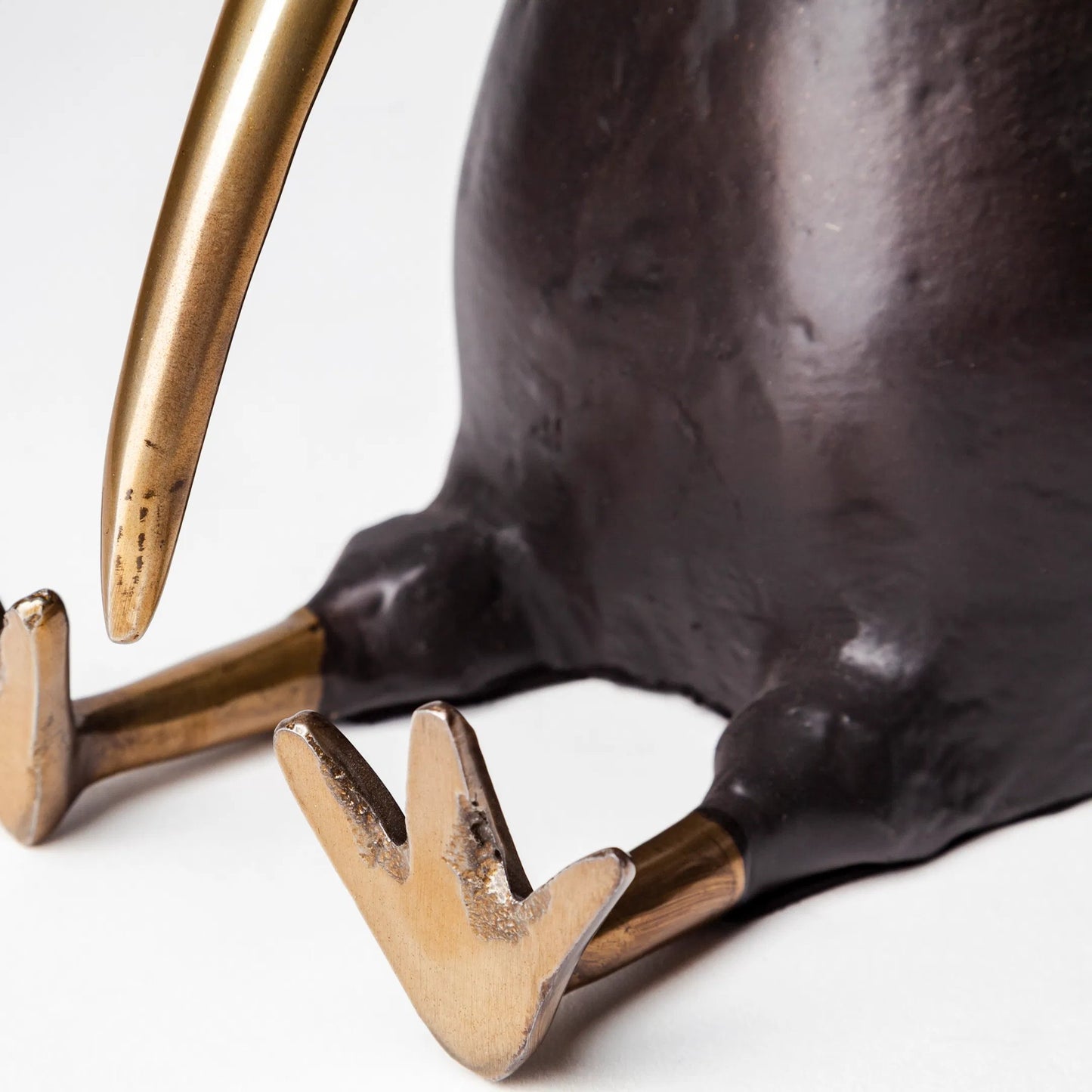 050 SR-815066 | Closeup | Dodo Cast Aluminum Mauritian Bird Sculpture by Mercana in black, antiqued gold. Made from unique in a eclectic & global style.