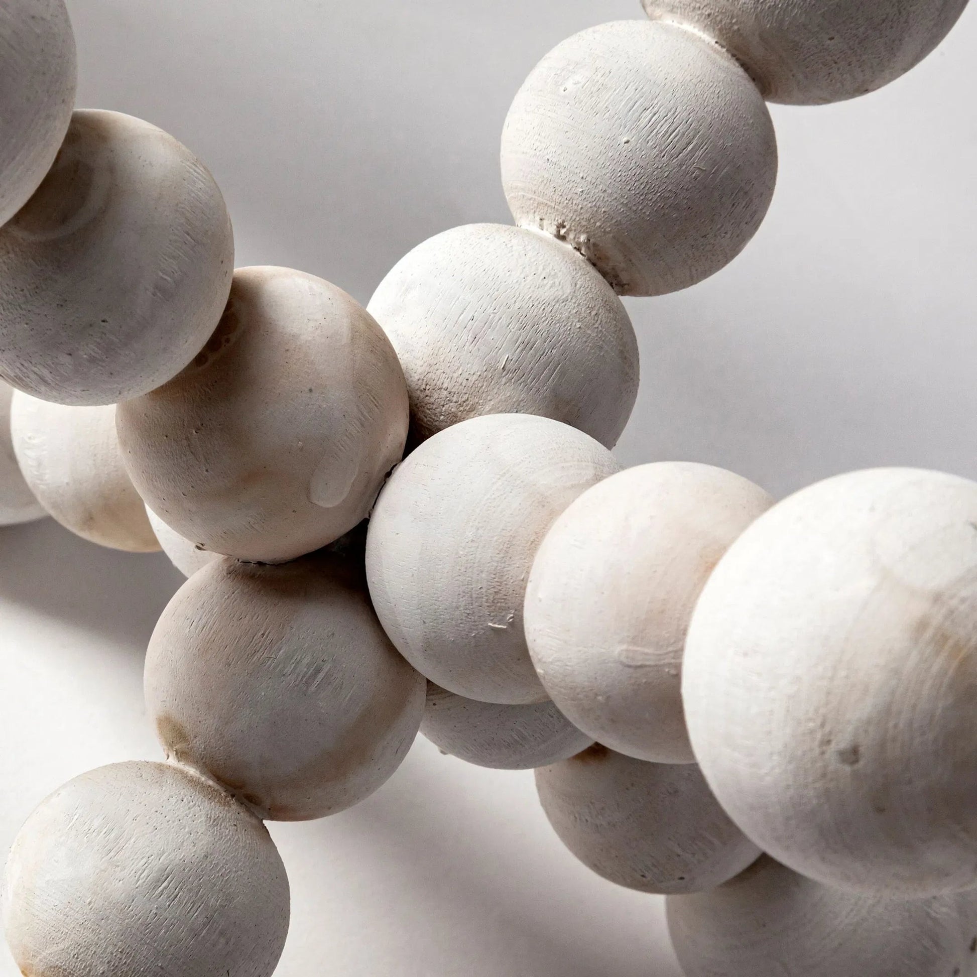 Carrollton I Off- Geometric Wood Ball Jack by Mercana in white wash. Made from unique in a eclectic & global style.