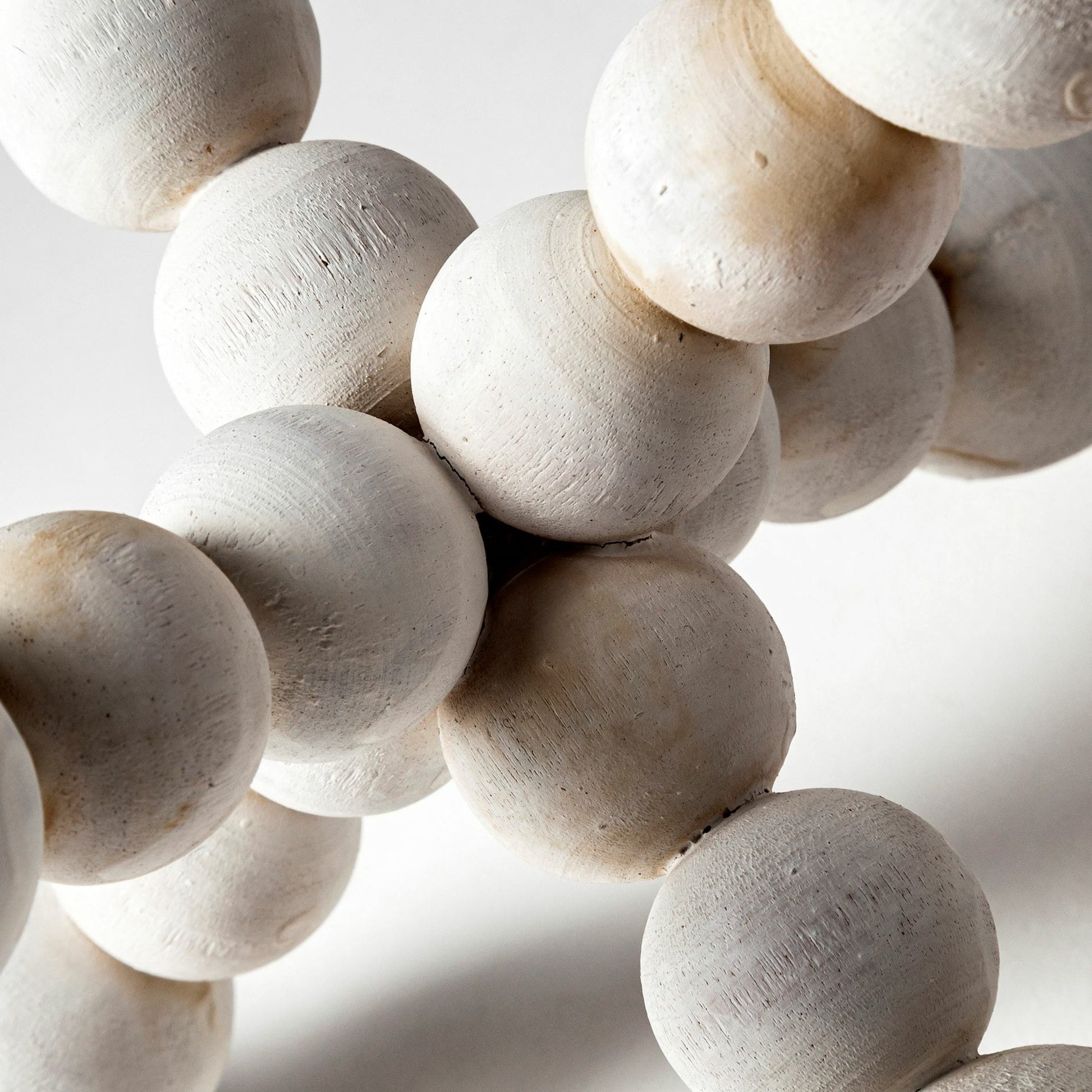 Carrollton I Off- Geometric Wood Ball Jack by Mercana in white wash. Made from unique in a eclectic & global style.