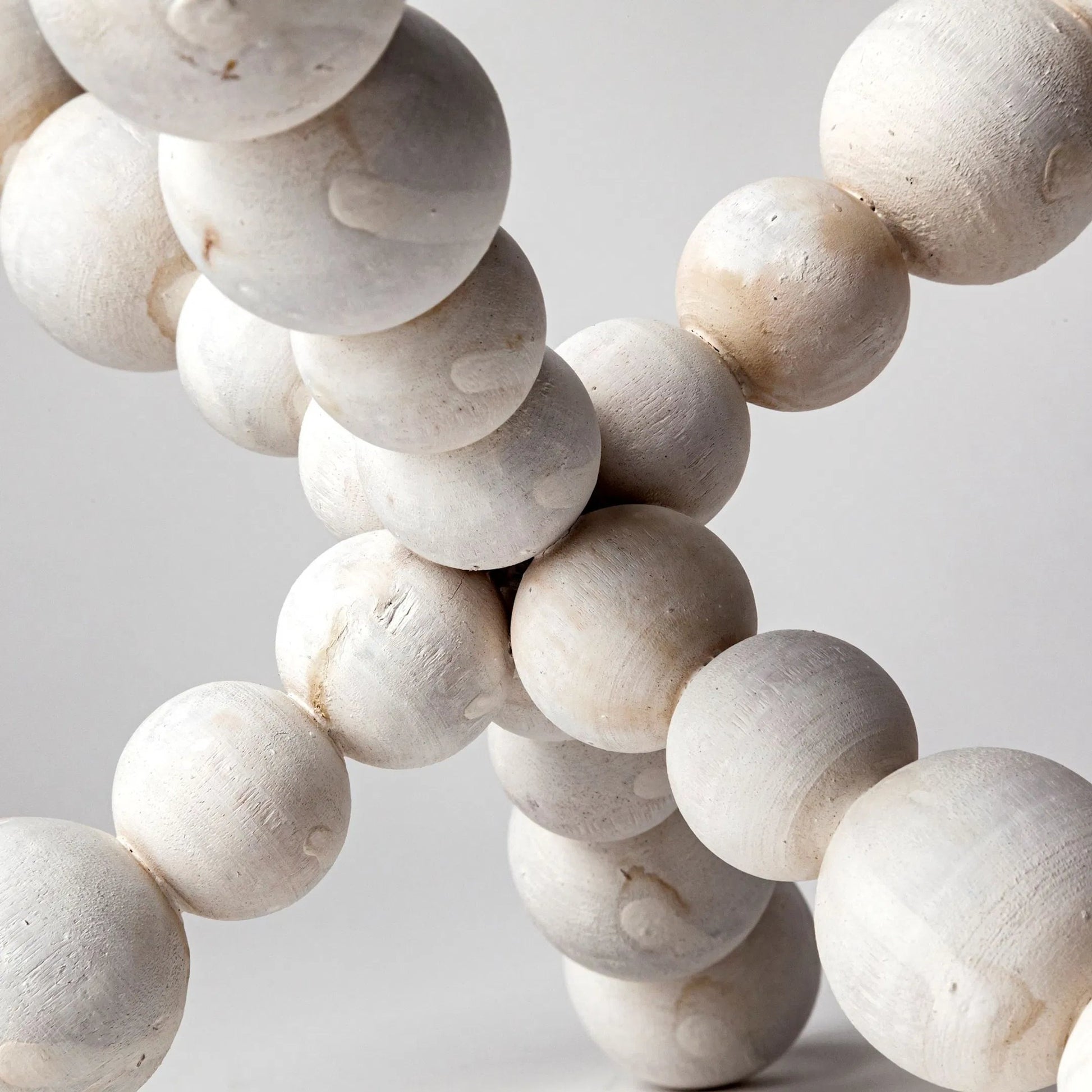 Carrollton I Off- Geometric Wood Ball Jack by Mercana in white wash. Made from unique in a eclectic & global style.