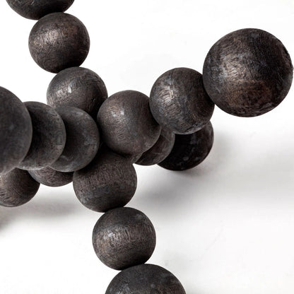 Carollan I Geometric Wood Ball Jack by Mercana in rustic black. Made from unique in a modern style.