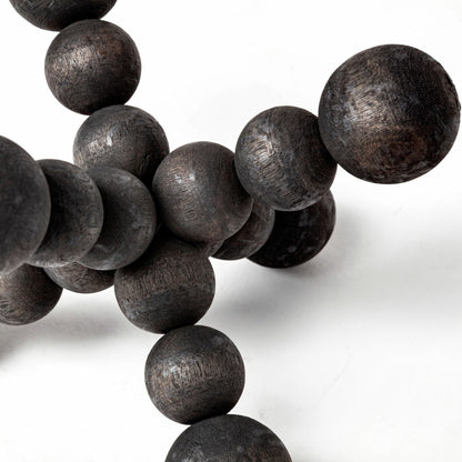 Carollan I Geometric Wood Ball Jack by Mercana in rustic black. Made from unique in a modern style.