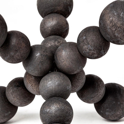 Carollan I Geometric Wood Ball Jack by Mercana in rustic black. Made from unique in a modern style.