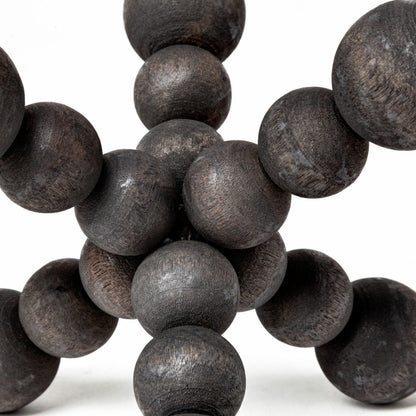 Carollan I Geometric Wood Ball Jack by Mercana in rustic black. Made from unique in a modern style.