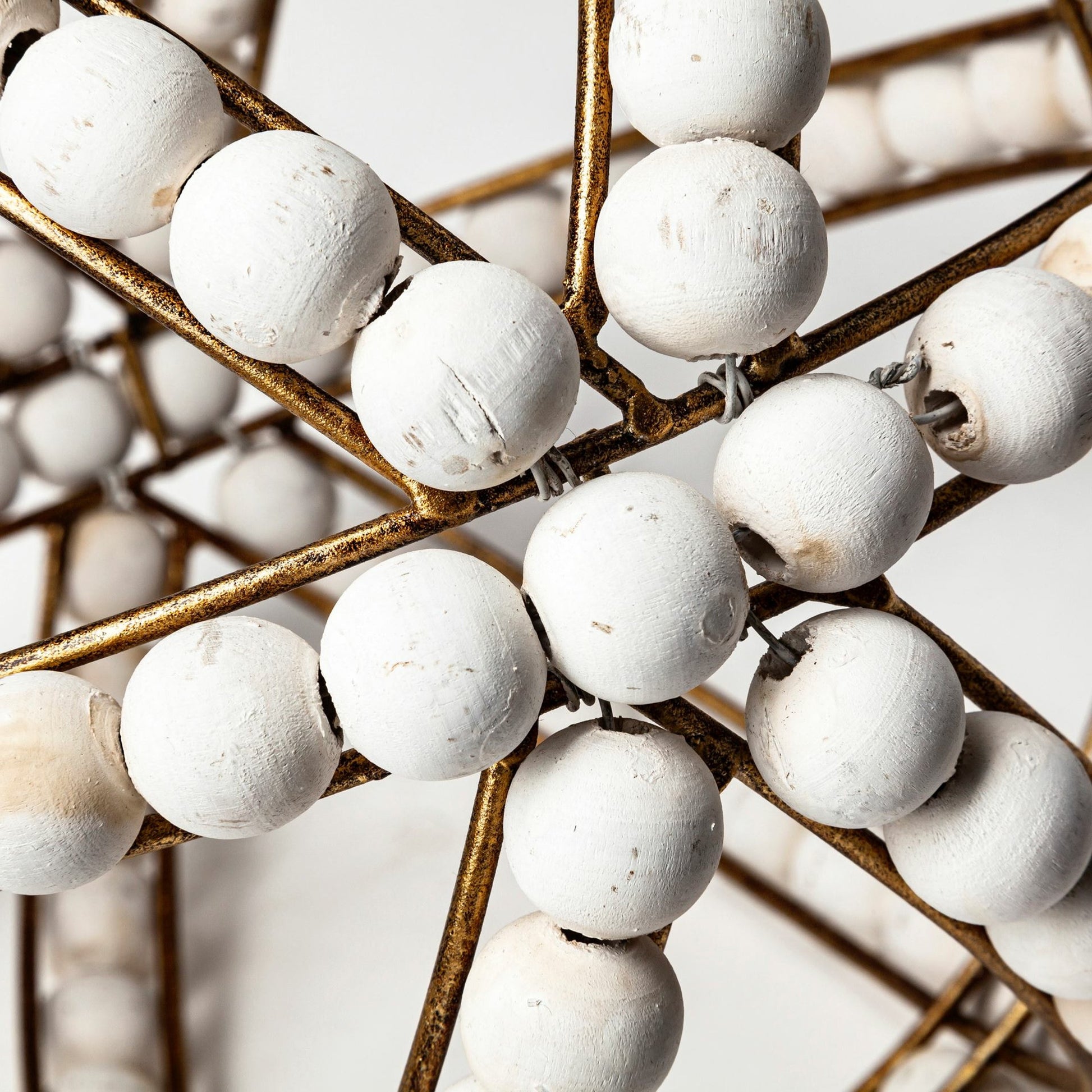 Espanlade I Wooden Beaded Orb by Mercana in white. Made from unique in a coastal style.