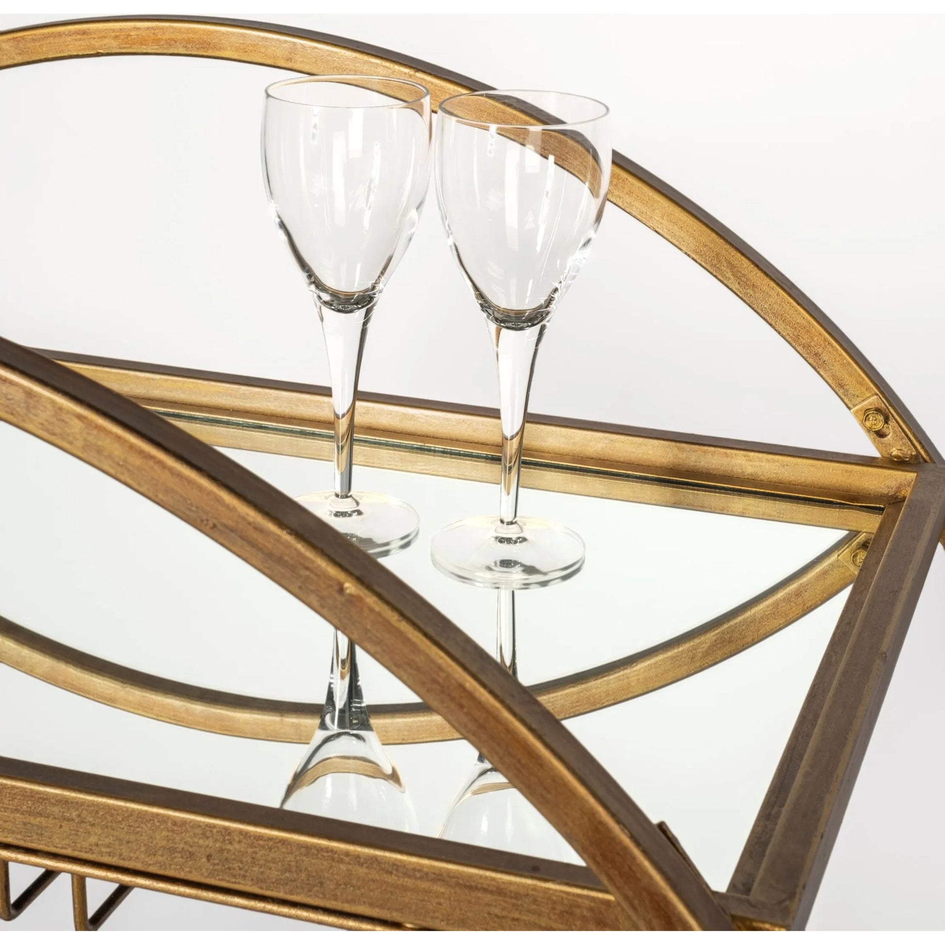 Carola Bar Cart by Mercana in gold. Made from unique in a modern style.