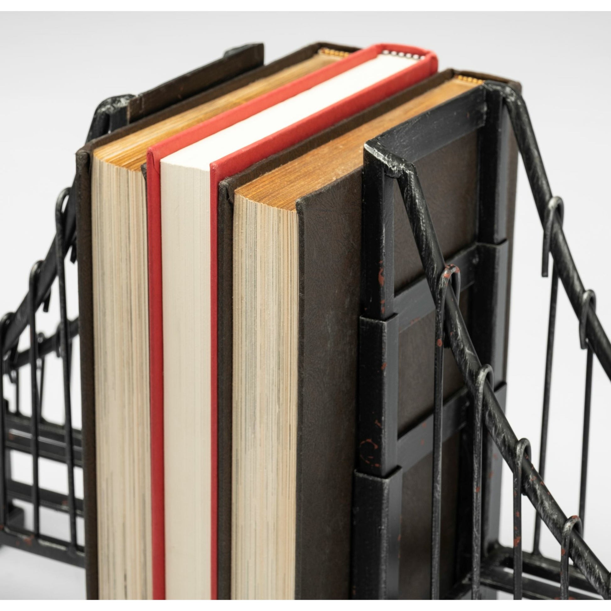 Suspension Wrought Iron Suspension Bridge Bookends Set of Two by Mercana in brown. Made from unique in a traditional style.