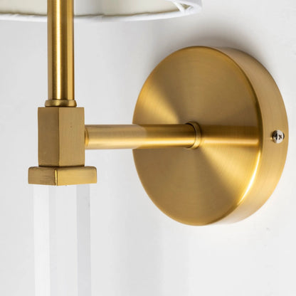 Santander Wall Sconce by Mercana in gold. Made from unique in a transitional style.