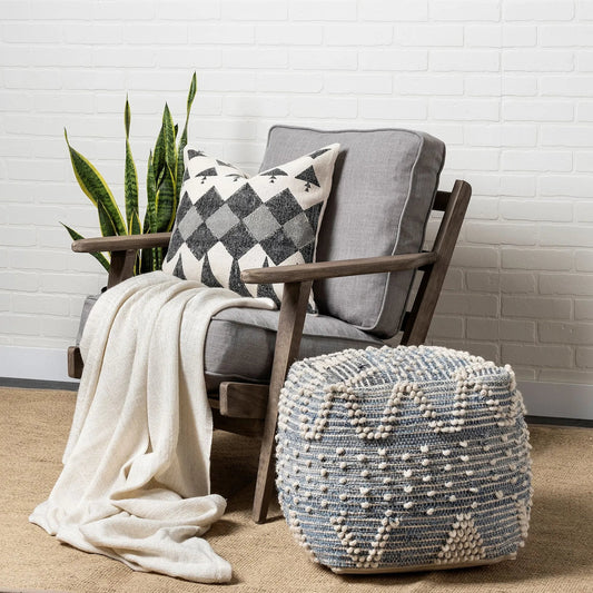 Rofi Pouf by Mercana in blue. Made from wool in a eclectic & global style.
