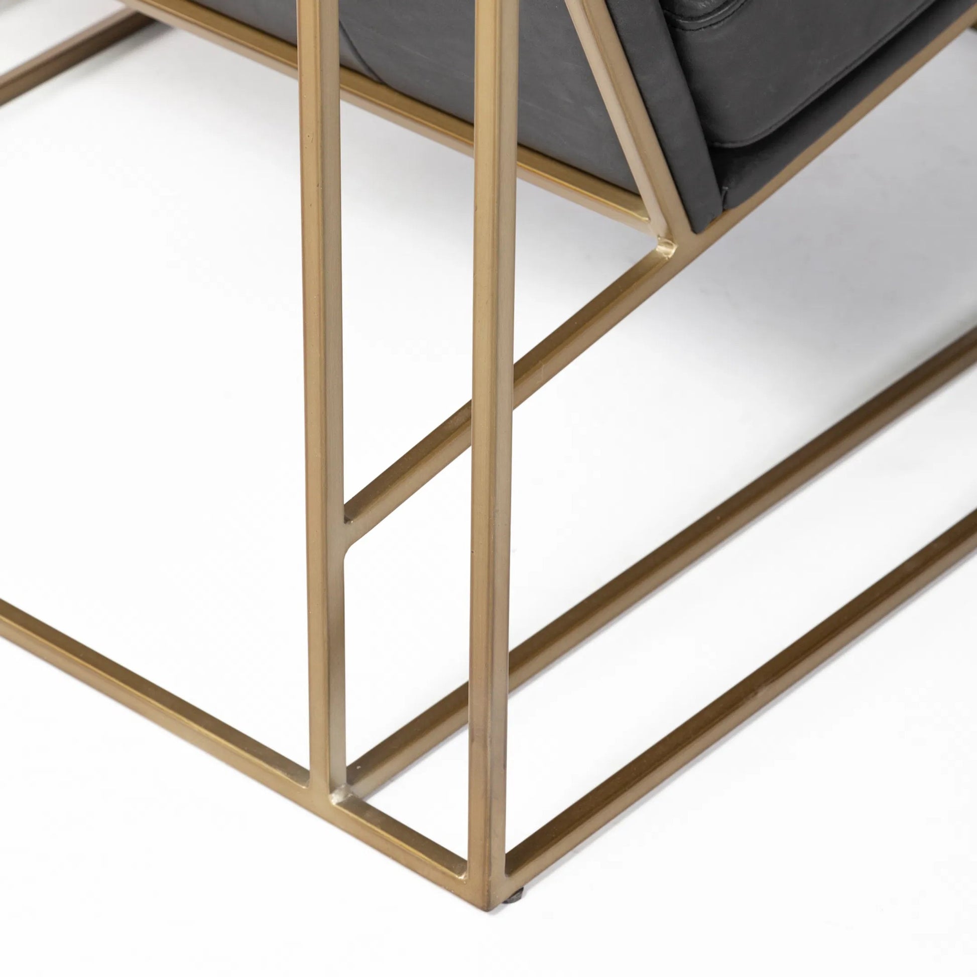 Watson Leather Accent Chair by Mercana in black. Made from iron in a unique style.