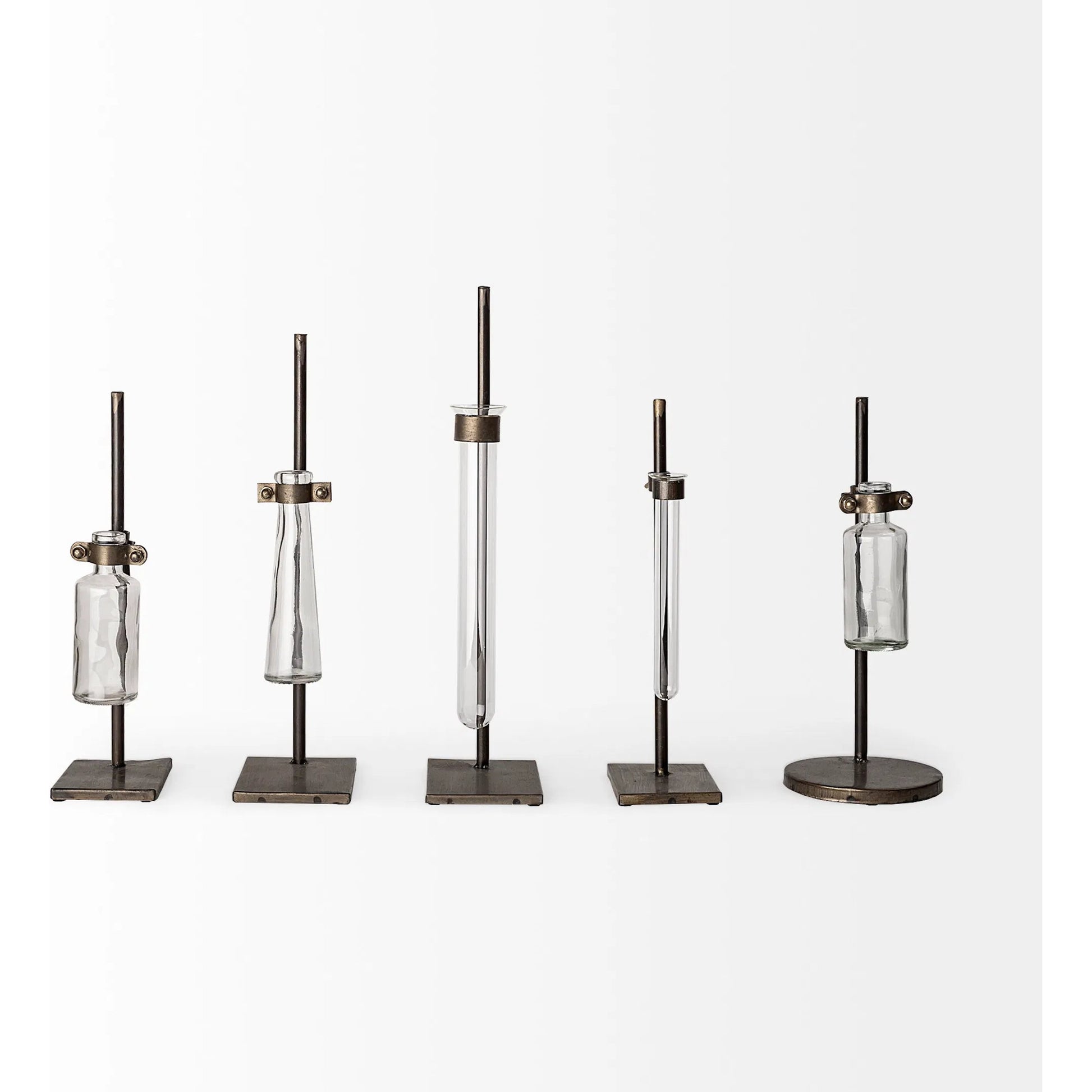 Jarvis Dark Glass Chemistry Inspired Bottles Set of Five by Mercana in dark brown metal. Made from unique in a modern style.