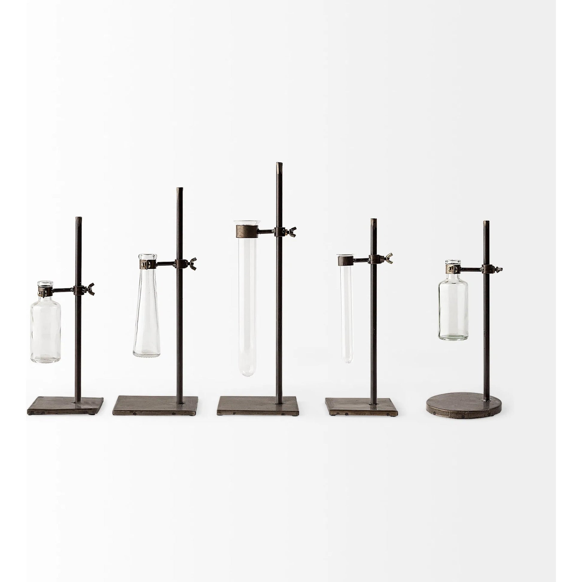 Jarvis Dark Glass Chemistry Inspired Bottles Set of Five by Mercana in dark brown metal. Made from unique in a modern style.