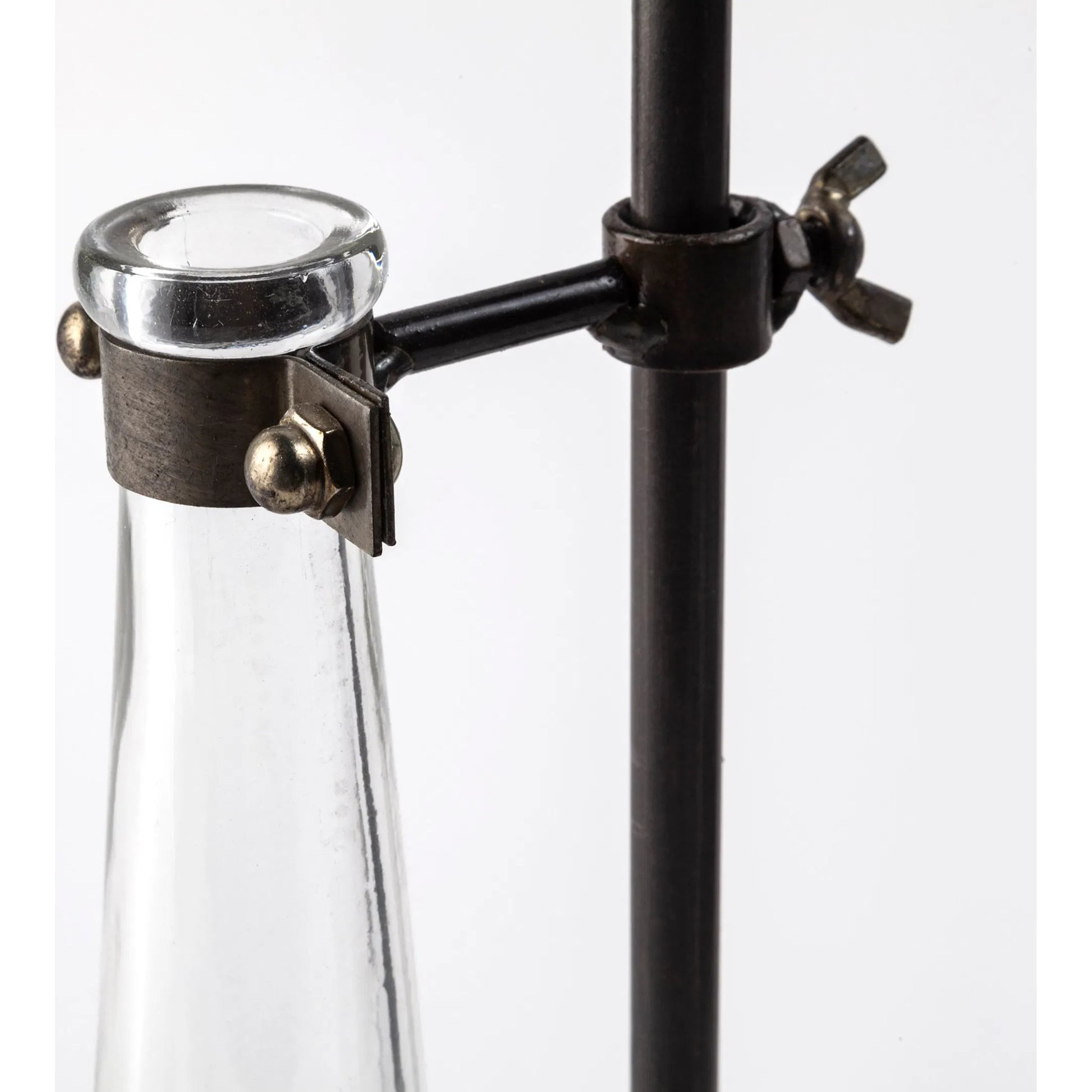 Jarvis Dark Glass Chemistry Inspired Bottles Set of Five by Mercana in dark brown metal. Made from unique in a modern style.