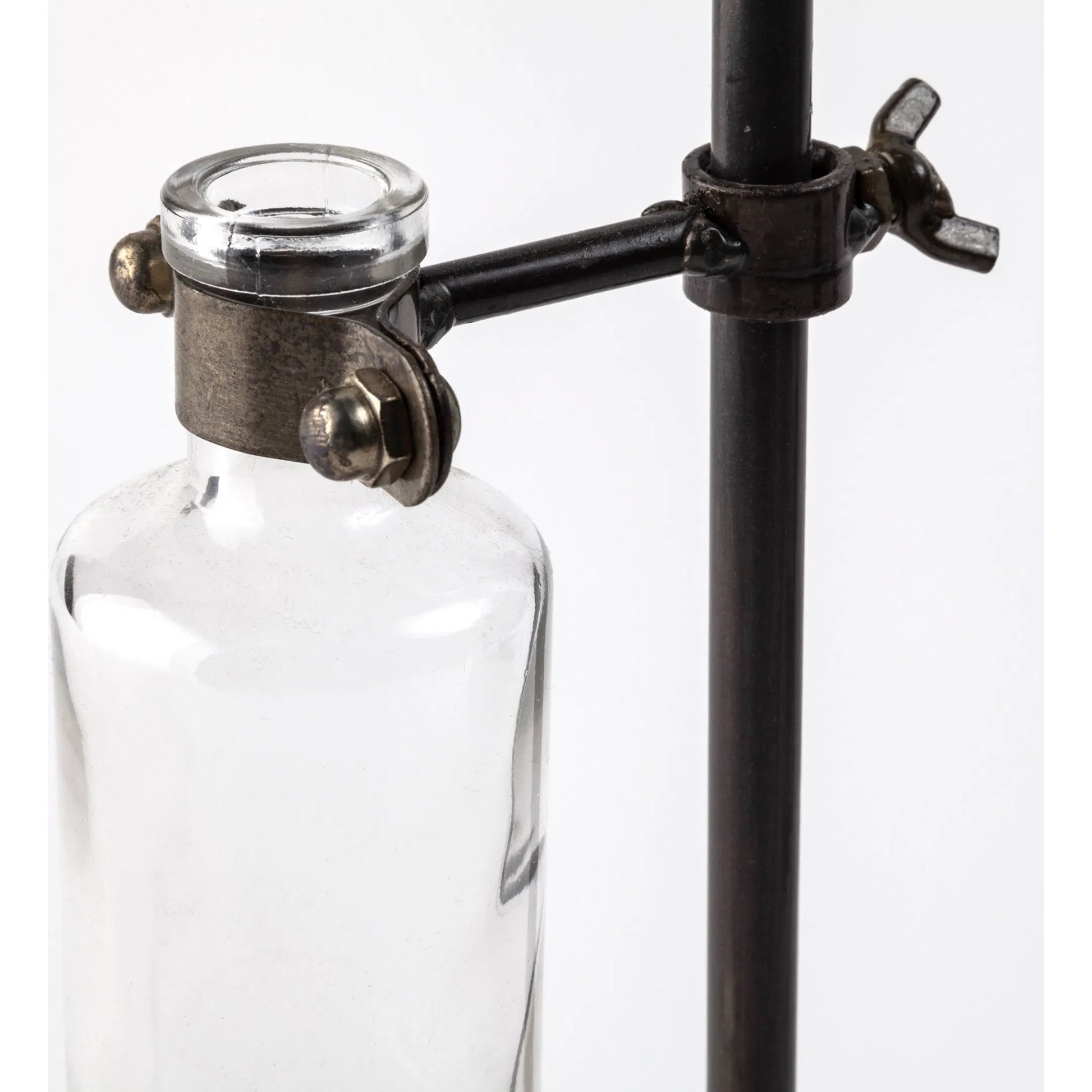 Jarvis Dark Glass Chemistry Inspired Bottles Set of Five by Mercana in dark brown metal. Made from unique in a modern style.