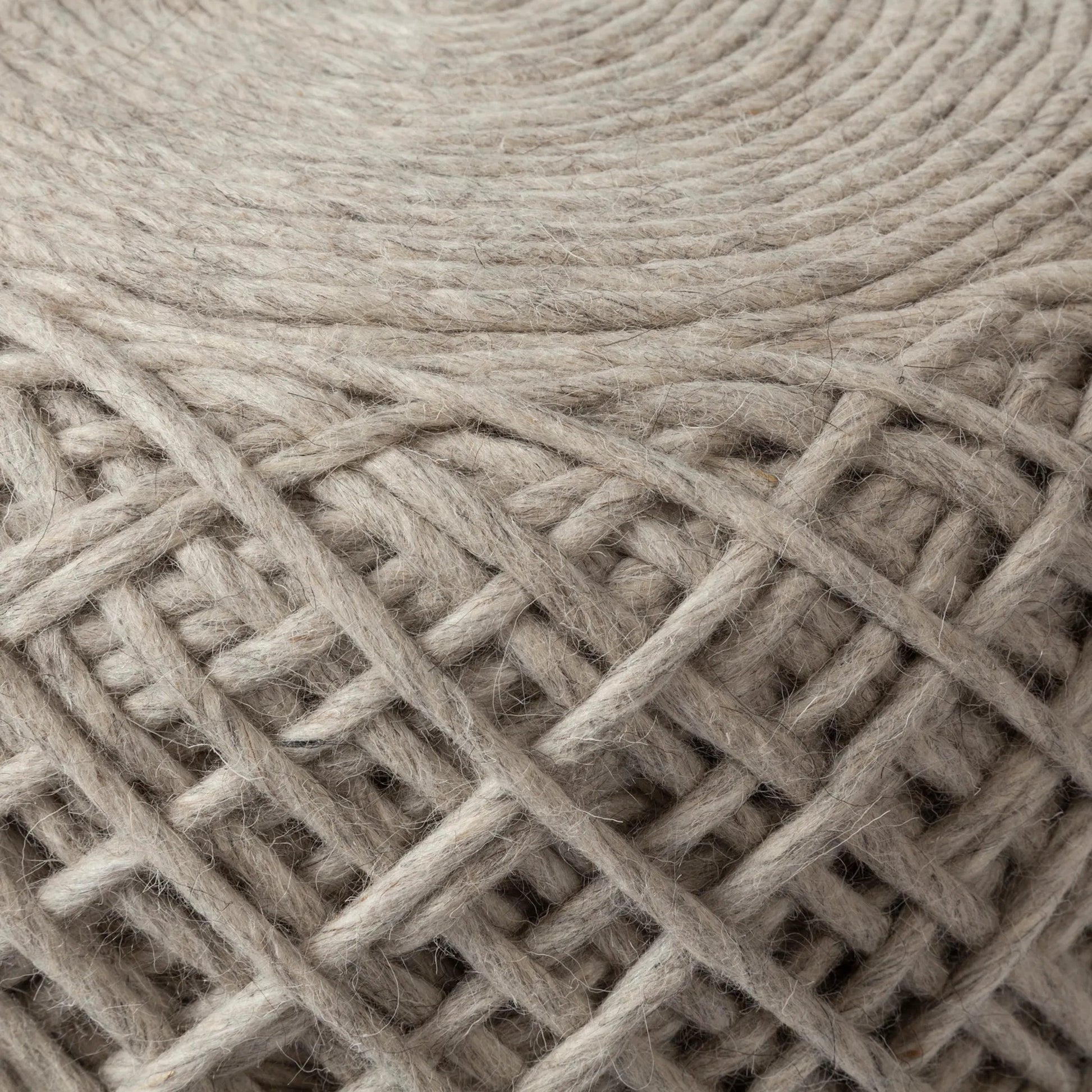 Allium Pouf by Mercana. Made from handwoven wool in a eclectic & global style.