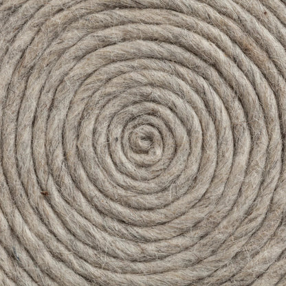 Allium Pouf by Mercana. Made from handwoven wool in a eclectic & global style.