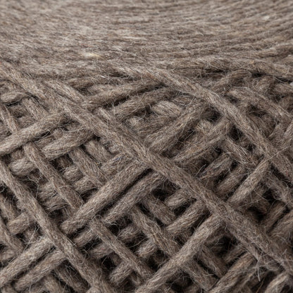 Allium Pouf by Mercana. Made from handwoven wool in a eclectic & global style.